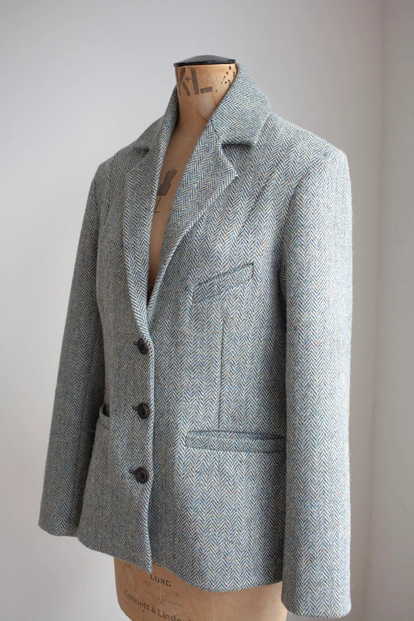 Gray herringbone blazermade using Naomi Blazer PDF Sewing Pattern on a mannequin against a plain background