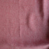 Close-up of a textured Rustic Rose textured linen fabric in earthy rose-pink, 100% linen yarn dyed, 225 GSM, 25 LEA.