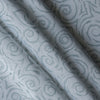Tidal Whirl 100% linen fabric with soft blue-grey swirling coastal print