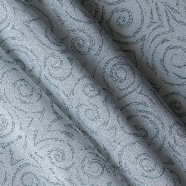 Tidal Whirl 100% linen fabric with soft blue-grey swirling coastal print