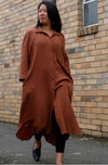 Anais Woven Dress sewing pattern, highlighting its long line shirt dress design with long sleeves, shirt tails, collar, and pockets for a refined and stylish garment