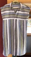 Illustration of the Autumn Dress sewing pattern, highlighting the elegant pleats, extended shoulders, and unique details that make this dress a fashionable choice for any occasion.