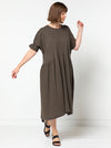Elegant Eileen Dress pattern with shirred sleeve detail, gathered side waist, and round neckline, offering a blend of classic and modern style.