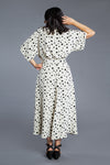 Charming Elodie Wrap Dress pattern with release pleats, dolman sleeves, and a choice of skirt lengths, perfect for any occasion from picnics to weddings