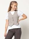 Joy Woven Vest sewing pattern featuring faux welt pockets, princess line, button opening with four buttons, cutaway at center back, easy fit, and fully lined, suitable for linen and cotton fabrics.