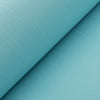 Fun and bright light blue linen fabric with a cyan base tone and relaxed slub texture