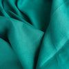 Persian Green 100% linen fabric, perfect for creating vibrant summer shirts, dresses, skirts, and loose pants.